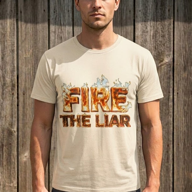 Man wearing a t-shirt with 'FIRE THE LIAR' text against a wooden background