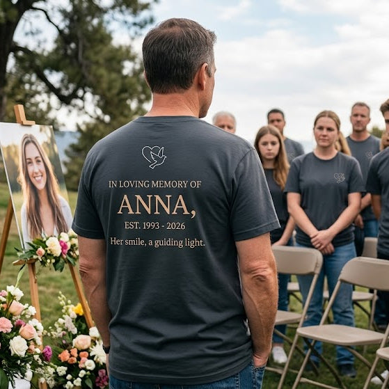 Memorial service for a woman named Anna with attendees in gray shirts.
